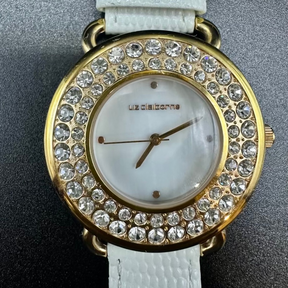 Liz Claiborne Women’s Gold-Tone Crystal Bezel Watch – Mother-of-Pearl Dial + Whi